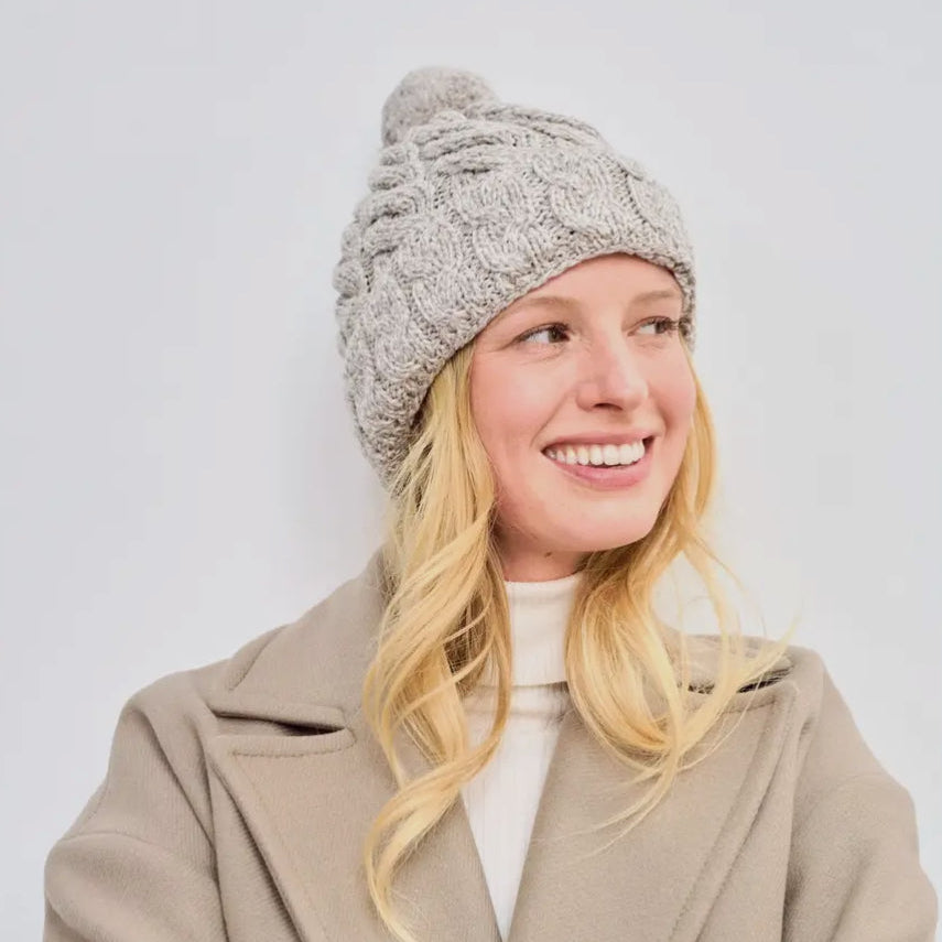 Clifden Cable Aran Beanie with Pom Poms - Oat